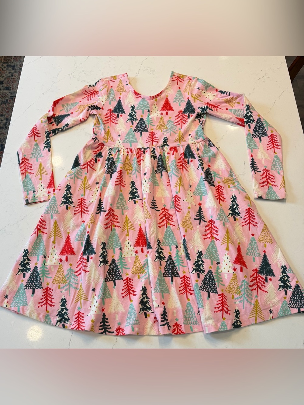 Hanna Andersson Long Sleeve Skater Dress with Pockets in the "Twinkly Trees